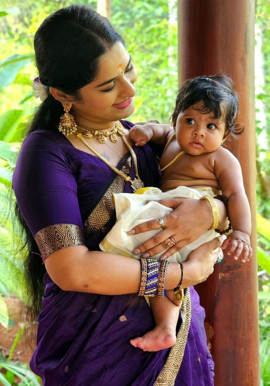 Regal Charm – Purple Silk Saree with Golden Zari Border