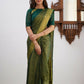 Sharini – Traditional Green Soft Silk Saree with Refined Weaves
