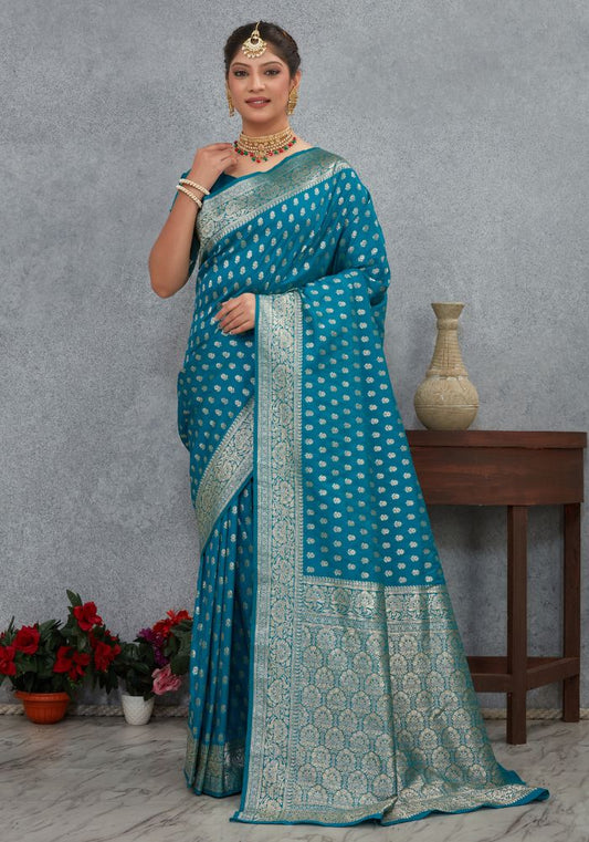 Charmi Teal Blue Banarasi Soft Silk Saree