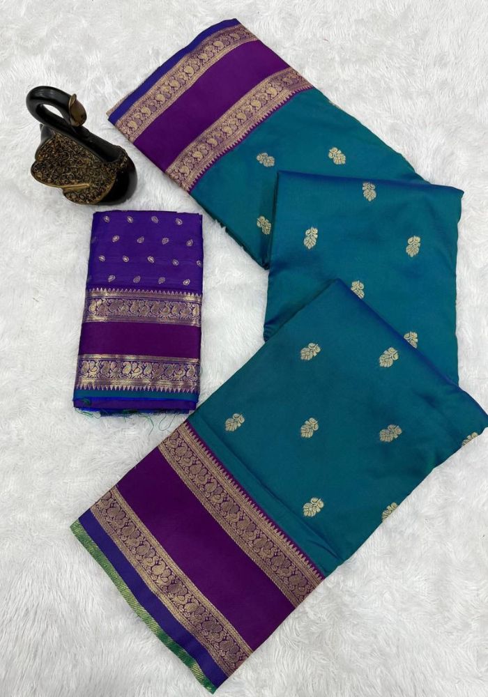Symmetrical Rama Soft Banarasi Silk Saree With Captivating Blouse Piece