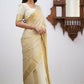 Sharini – Traditional Beige Soft Silk Saree with Refined Weaves