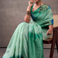 Effulgent Turquoise Cotton Silk Saree With Lustrous Blouse Piece